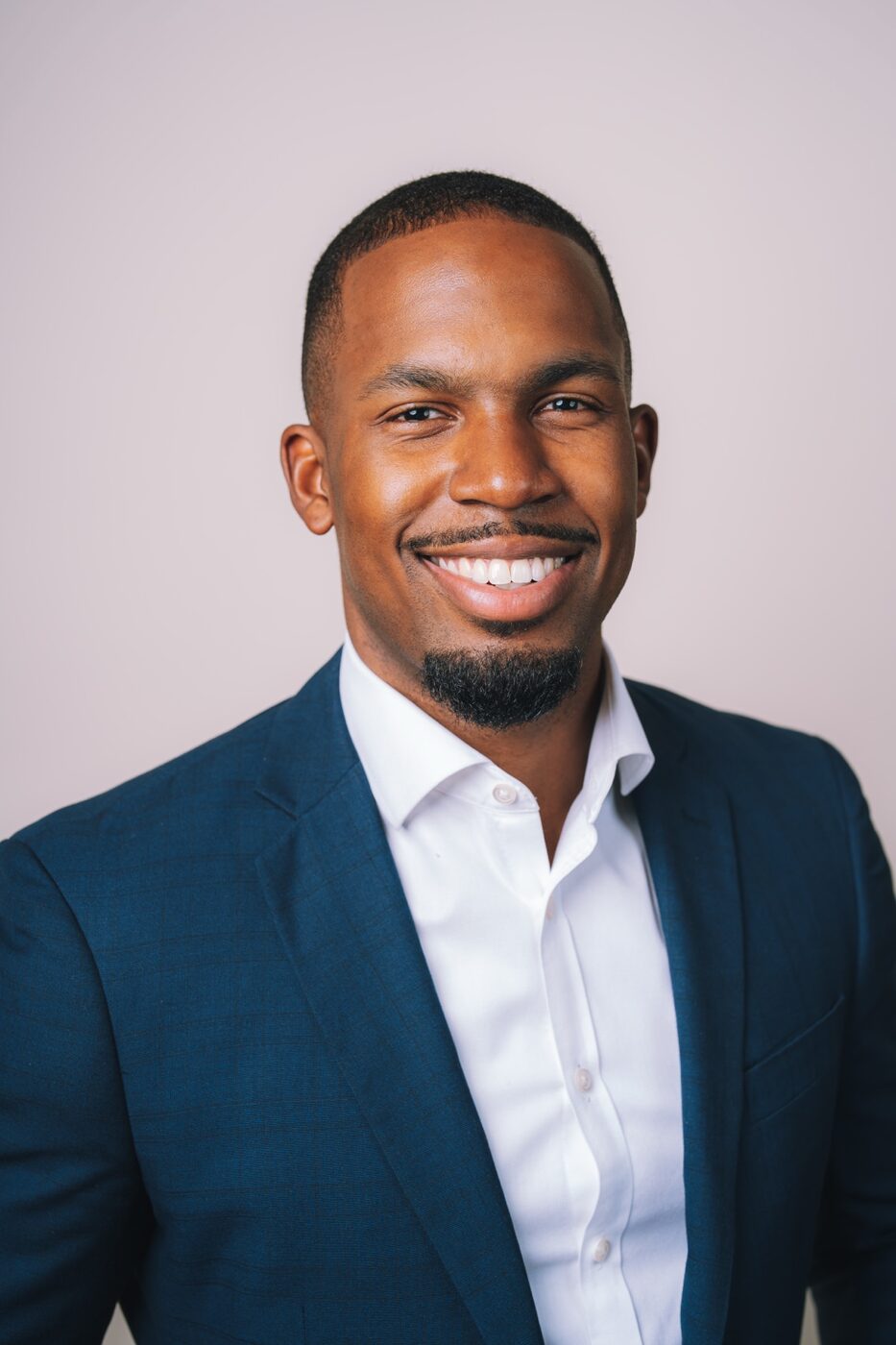 Professional studio headshot of a man